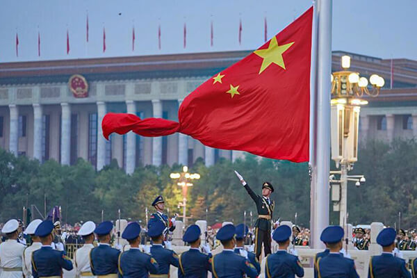 Raising the red flag in Tiananmen Square